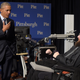 President Barack Obama with Nathan Copeland, who can feel despite paralysis. IMAGE: AP Images